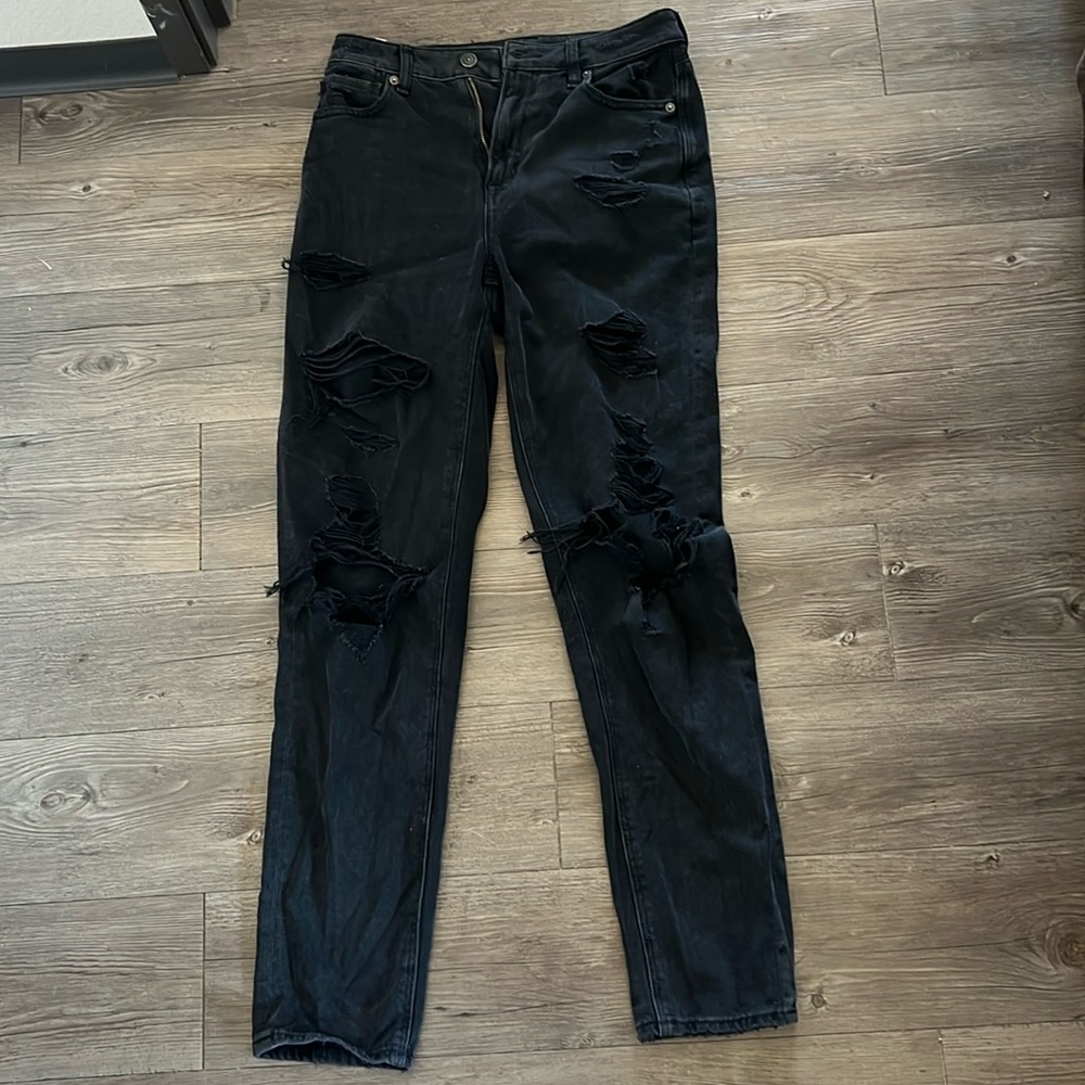black jeans with holes